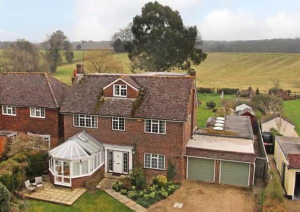 Hamptons International in Horsham are marketing this detached family house in Loxwood.