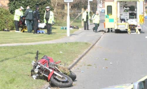 The motorcycle on the side of the road after the incident. Picture by Eddie Mitchell