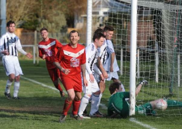 On the up. Gareth Dutton scores in 4-0 win over Loxwood recently