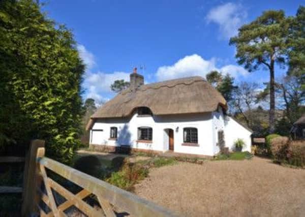 This lovely Wells cottage is set in a quiet lane in the sought-after village of West Chiltington