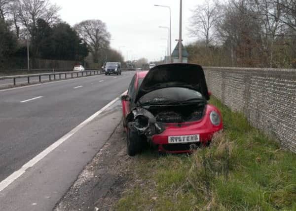 Red Volkswagen Beetle which caught fire on A27 on April 5 around 8.40am