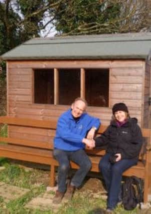 Nigel Wait and Maggie Weir-Wilson with the donated shed. Picture submitted