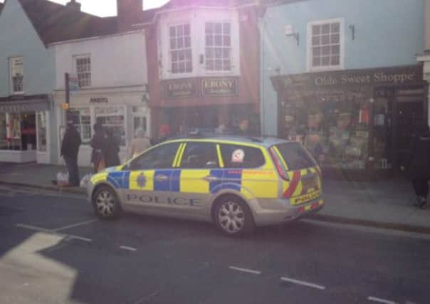 Police car outside Ebony Jewellers in South Street, Chichester on April 6.