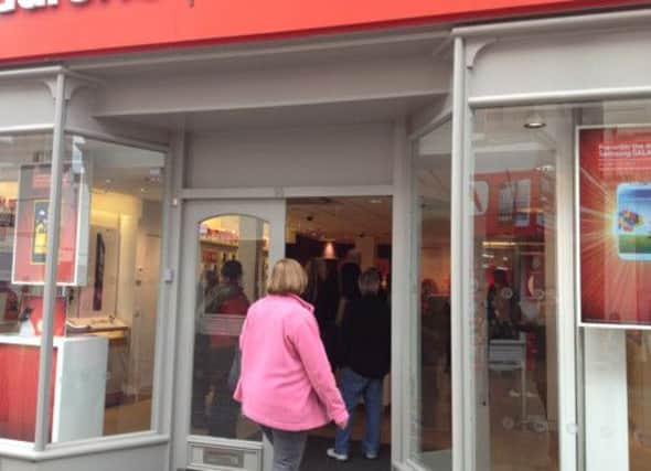 Customers at the Vodafone store in Montague Street