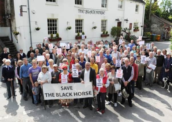 JPCT 13-06-12 S12250050X protesters outside Black Horse at Amberley, which is threatened with being turned into houses -photo by Steve Cobb