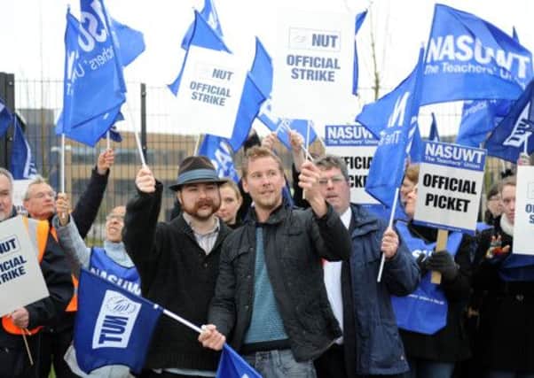 Some of the teaching staff and union representatives on strike during a protest at The Littlehampton Academy, on Wednesday (April 17) PHOTO: Liz Pearce