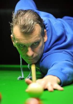 Mark Davis leads John Higgins 6-3 after the first session at the Betfair World Snooker Championship. Picture by Steve Hunnisett (eh17009f)