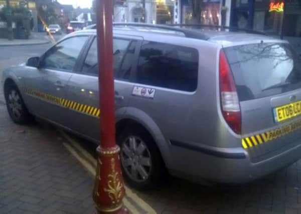 Horsham District Council parking enforcement car pictured by Nick Costin on double yellow lines in April