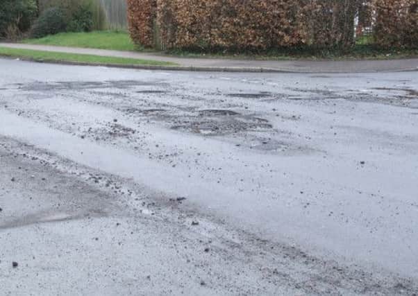 Potholes in Church Road (submitted).
