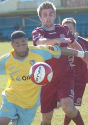 Zac Attwood challenges for the ball during Hastings United's 1-1 draw away to Canvey Island on Saturday. Picture by Simon Newstead