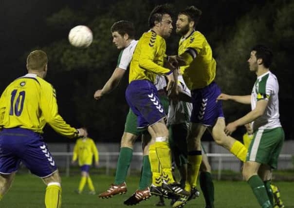 City put the Lancing defence under pressure in the 0-0 draw at Oaklands Park  Picture by Chris Hatton