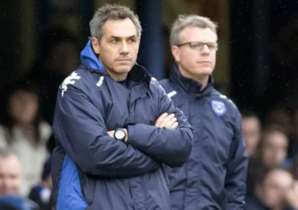 ompey boss Guy Whittingham, left, wants to have Andy Awford by his side again when Pompey kick-off the 2013-14 campaign in League Two