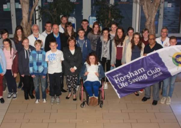 Emily with her parents, the Horsham Life Saving Club Swimarathon Team and all the Life saving Club members. Picture submitted