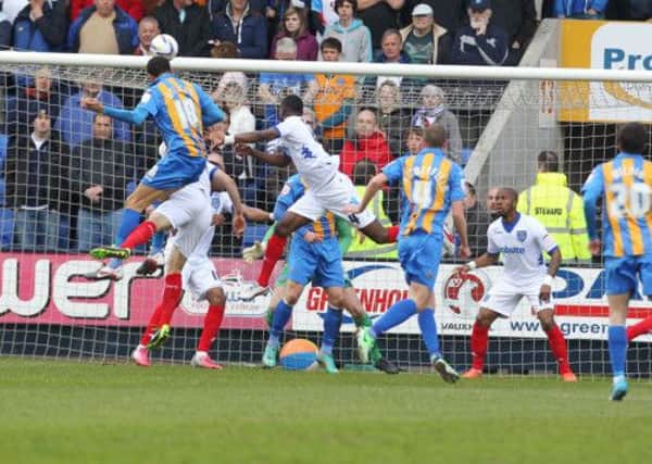 Shrewsbury's Connor Goldson scores the opening goal against Pompey   Picture: Joe Pepler