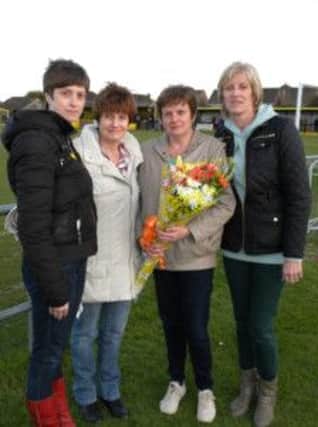 David's four daughters who were presented with flowers by Littlehampton Football Club, on Tuesday