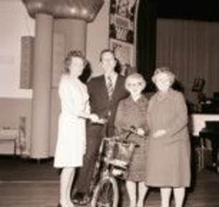 Group with bike at the Pavilion Theatre, Worthing