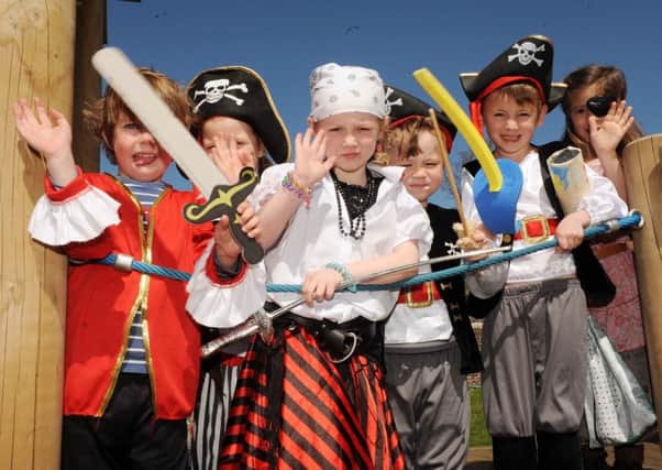 Pirates a'hoy as pupils board they playground ship in Arundel  L18978H13