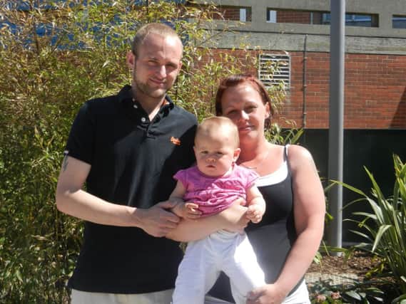 Karley Keegan, 31, and Ross Gibbs, 27, pictured with Karley's daughter, Jazmin, 15 months