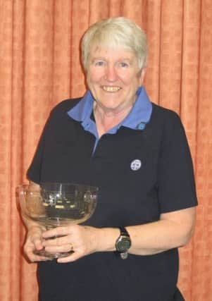 Leading Girlguiding figure Pat Rawson is presented with a prestigious award for her commitment to the organisation