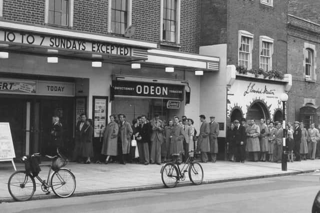 Queuing at the Odeon, in South Street, for a Walt Disney film in August 1954.