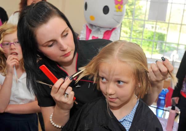 9/5/13- Charity hair-cut for Samantha Yeeles-Sorrell, Ninfield.  Samantha with hairdresser Beverley Arnold-Harman