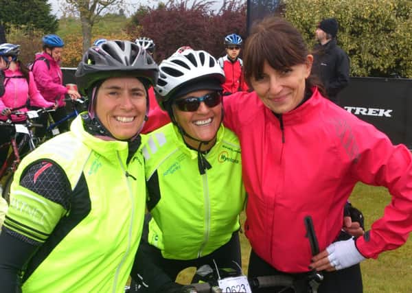 "Crazy Ladies" Susie de Las Casas (left) and Karen Holman, with television presenter Davina McCall on a 100km ride, part of their training for their Land's End to John O Groats cycle