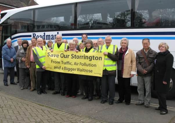 Save Our Storrington Campaign Group at County Hall with the local coach that transported them