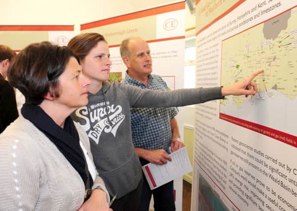 JPCT 180513 Consultation in Kirdford Village Hall over drilling plans near Wisborough Green. Visitors L to R Connie, Vicky and James Claydon. Photo by Derek Martin