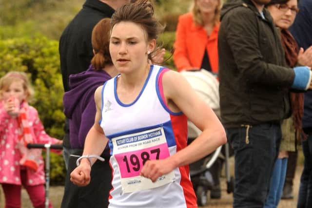 Cassie Thorp from Portsmouth on her way to winning the women's race at Bognor  Picture by Louise Adams C130690-8