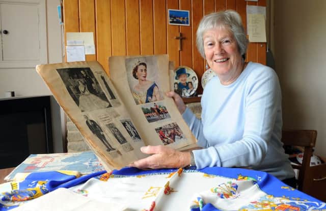 C130665-1 Bog May16 Headlines Queen  phot kate

Carol Andrews with some of her memorabilia from the Coronation.Picture by Kate Shemilt.C130665-1