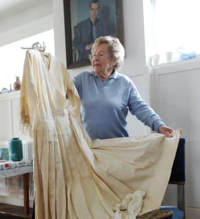 C130667-2 Bog May16 Headlines Queen2 
Joan Aubrey Jones with the dress she wore to the coronation.Picture by Kate Shemilt.C130667-2
