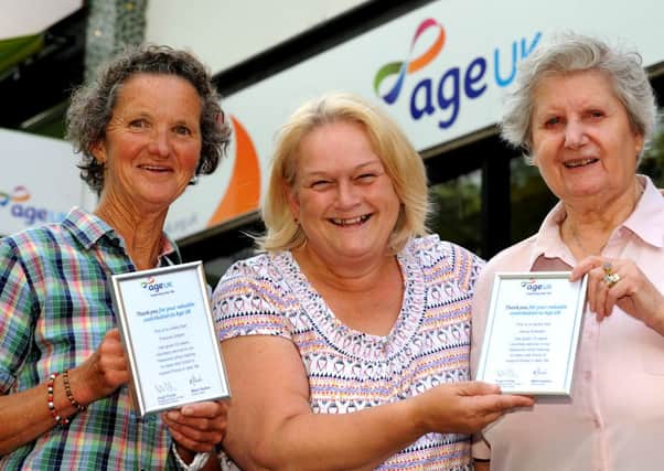 JPMT. Presentation to two long serving volunteers at Age UK Hassocks. Frances Gilbert (20 years service), Sheila Ozdemirciler (Area Manager Age UK), and Jenny Everden (15 years service)