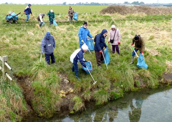 Members of Ferring Conservation Group at a clean-up of Ferring Rife earlier this year