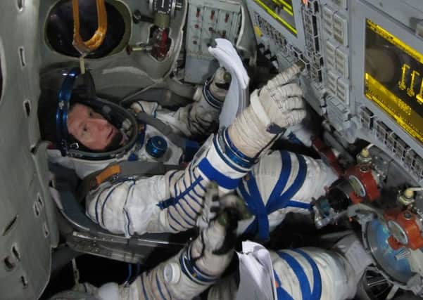 Tim Peake training in Soyuz simulator Picture by the European Space Agency