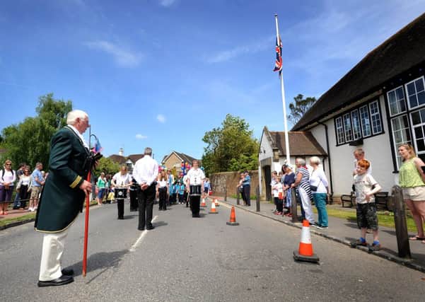 Lindfield Fun Day. Will Blunden pays his respects during the 1 minute's silence at the King Edward Hall