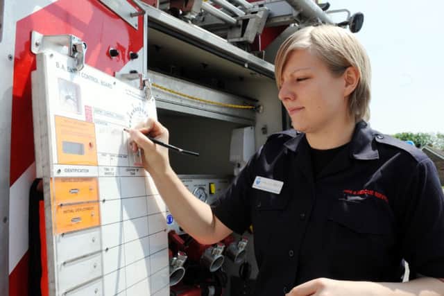 Firefighter Lisa Lillywhite at work.Picture by Kate Shemilt.C130736-3
