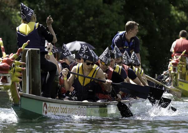 Wiley's Dragons finish ahead of 1st Barnham Scout Group in the second dragon boat race of the day.