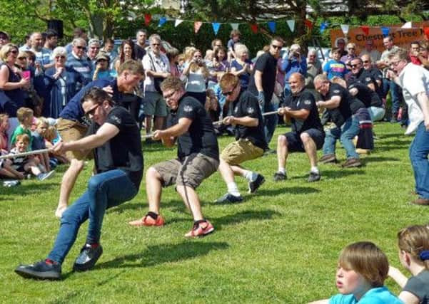 The Clockhouse team, on their way to victory in the East Preston Festival tug of war competition