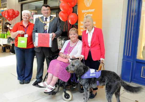 National Volunteer Week  Event at the Guildbourne Centre. Pictured is L-R Cath Barry (Volunteer Centre Organiser Worthing), Mayor of Worthing (Cllr Bob Smytherman), Mayoress of Worthing, Cllr Norah Fisher, Annie Ivil ( Volunteer from Freedom Power Chairs) and Herbie the dog