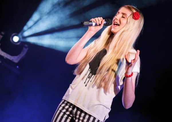 Bryony Brookman perfoms on stage at the Teen Star UK regional finals