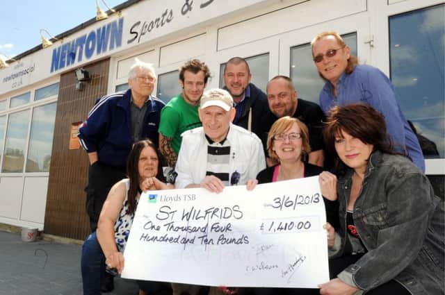 C130745-1 Bog Jun6 Hospice  phot kate

Caroline Wilson, front left, and Ian Harding, second front left, who organised a fund raising concert for St Wilfrids Hospice and raised Â£1,409 .Picture by Kate Shemilt.C130745-1