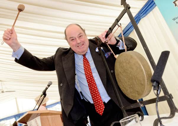 Nicholas Soames launches the competition by hitting the gong
Sussex Food Awards Launch at The South of England Show 06/06/13