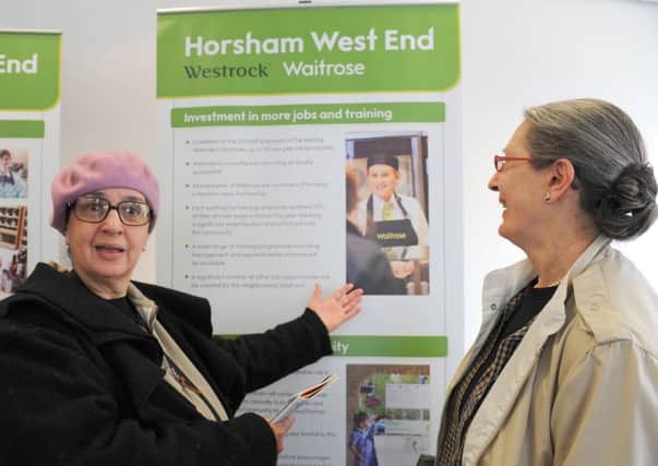 JPCT 070613 Public exhibition of plans for new Waitrose in Horsham. Visitors, Janet Brown and ane Kennedy. Photo by Derek Martin