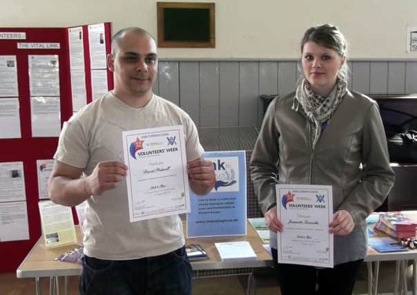 David Pedwell, left, and Jeannette Torowska were just two of the volunteers praised for their efforts in helping needy causes across the Arun district, during a ceremony in Littlehampton