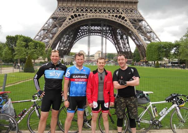 Steven Pye, Simon Hawkins, Jonathan Branson, Alex Burdfield at the finish in front of the Eiffel Tower.