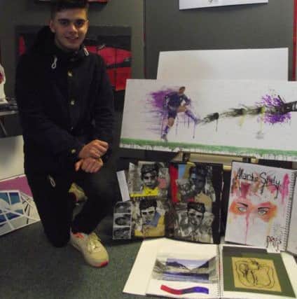 Oli East with his 2013 GCSE Art Show pieces