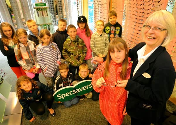 Children from Chernobyl have their eyes checked at Specsavers Haywards Heath
