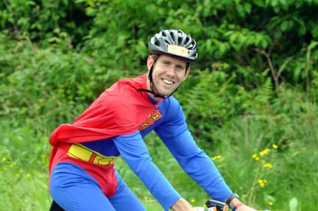 Superman at Ditchling Common near Burgess Hill  during today's (Sunday)  London-Brighton Bike Ride for charity pic Phil Dennett
