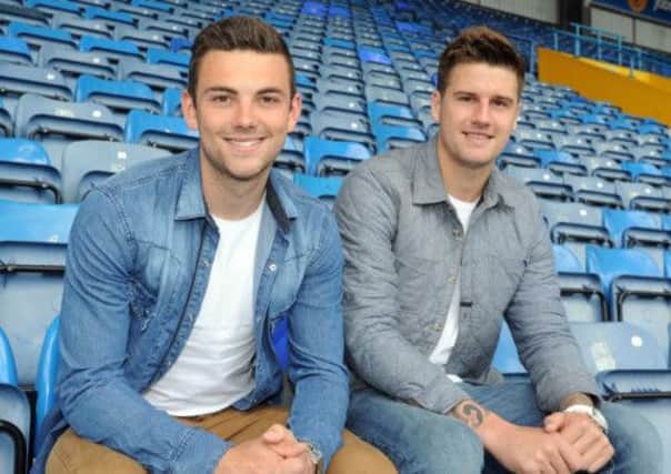Danny East and Sonny Bradley have signed for Pompey after coming through the Hull youth ranks together