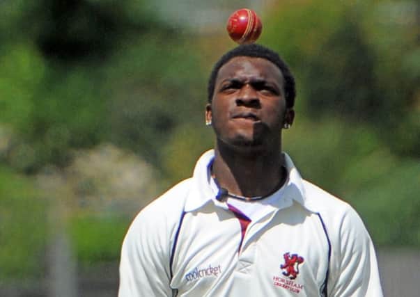 Finding form. Barbadian teenager Kamau Leverock took a fine 5-34 despite bowling into a strong wind. Photo by Steve Cobb